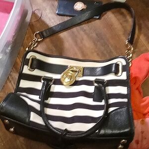 Michael kors black and white looks new seldom used